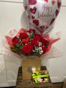 Dramatic dozen with balloon and chocolates